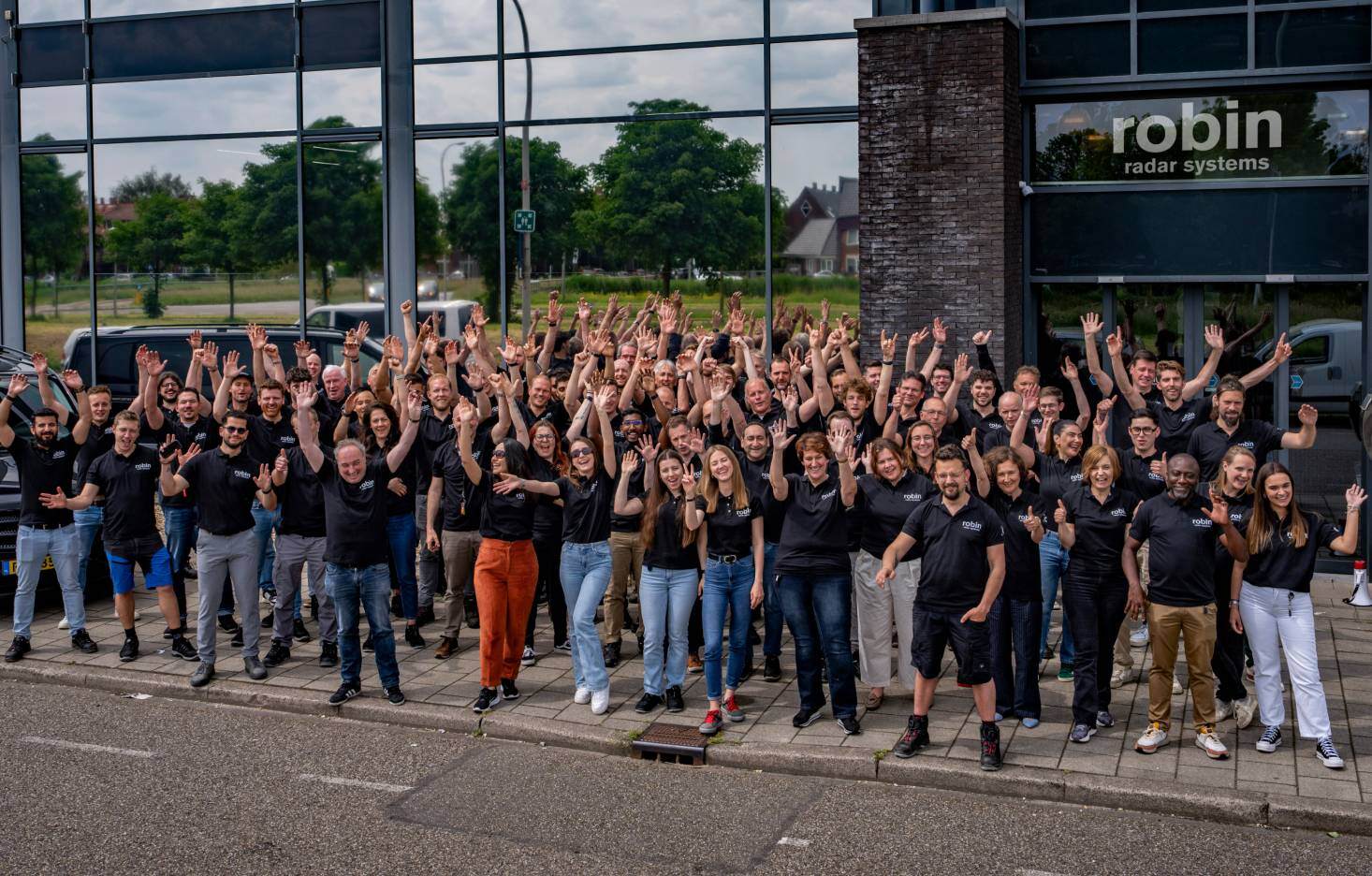 Robin Radar team outside building