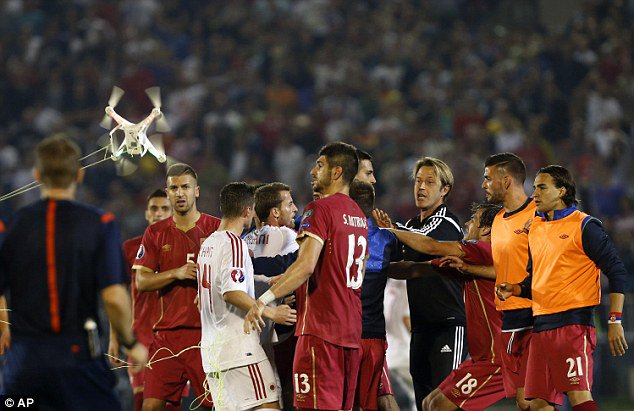 FLAG-FLYING DRONE THREAT CAUSES FOOTBALL CHAOS